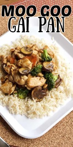 a white plate topped with rice and broccoli covered in mushroom gai pan sauce