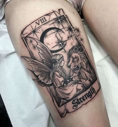 a tattoo on the leg of a woman with an angel holding a baby in her lap