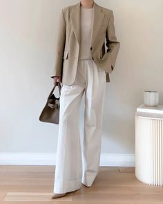 ELINOR WOOL SILK BLAZER BEIGE – SANNA New York Beige Corporate Attire, Classic Corporate Outfit, Beige Blazer Work Outfit, Beige Business Outfit, Neutral Professional Outfit, Beige Winter Suit With Lapel Collar, Chic Fall Suit With Pressed Crease, Fall Office Wear Suits With Pressed Crease, Oversized Wool Blazer For Spring