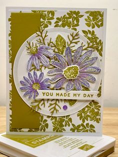 a close up of a card with flowers on it