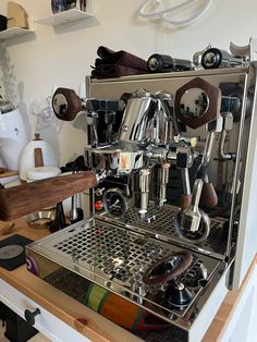 an espresso machine is sitting on a counter