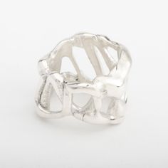 This "Wave" silver ring is handmade in 925 Sterling Silver in my workshop. The ring is hand crafted using a hot wax technique and cast in 92.5% pure silver. The name "Wave" is inspired by the shape randomly created by the casting technique. Because of its random pattern, turning the ring position around your finger will create a whole new look every day!Materials: 92.5% pure solid silverRing size: 7.5 (This is a unique creation. It cannot be reproduced or resized. Only one size available. I cann Artisan Hand Cast Silver Rings, Handmade Silver Rings, Avant Garde Jewelry, Edgy Jewelry, Random Pattern, Dope Jewelry, Handmade Rings, Silver Jewelry Handmade, Silver Rings Handmade