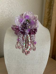 One of a kind Lavender Brooch Jewelry As A Gift, Elegant Handmade Purple Brooches, Flower-shaped Brooch For Party, Elegant Purple Brooches With Flower Decoration, Party Flower Shaped Brooch Jewelry, Flower Shaped Party Brooch, Bohemian Beaded Brooch For Party, Bohemian Beaded Brooches For Parties, Pink Beaded Brooches For Party