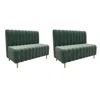 two green couches sitting next to each other