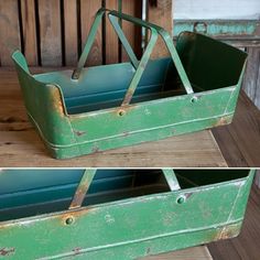 an old green metal container sitting on top of a wooden table