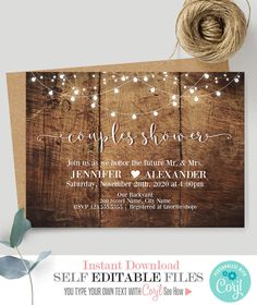 the rustic string lights wedding shower is displayed on top of a wooden sign with twine