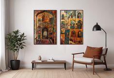 there are two paintings on the wall in this living room, one is colorful and the other is ornate