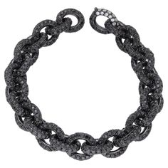 18 kt. black rhodium gold chain bracelet with full pave round-cut black diamonds. The clasp is embedded with white diamonds to make it easier to open. Round-cut Black diamonds: 33.50 carat Round-cut white diamonds: 0,25 carat 18 kt. Black Rhodium gold: 58.70 gr. This amazing bracelet is Hand-Made in Italy. The bracelet can be customized. Black Diamond Chain, Diamond Chain, Black Diamonds, Gold Bracelet Chain, Black Rhodium, White Diamonds, Black Diamond, Diamond White, Chain Bracelet