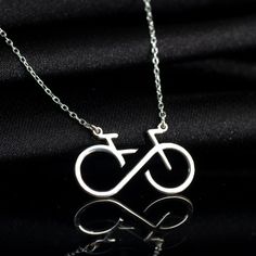 "Infinity Bicycle Necklace, Sterling Silver Bicycle Pendant is made by hand in our workshop with care. All our jewelry is the most elegant choice for the Bridesmaids, friends, your loved ones and for yourself.  Infinity Bicycle Necklace, Sterling Silver Bicycle Pendant * Material: High Quality Solid 925 Sterling Silver. * Finish: Sterling Silver ∙ Gold ∙ Rose Gold. * All our jewelry is custom made by hand with care in our workshop.  HOW TO ORDER ❓ * Select your necklace COLOR. * Choose necklace Bike Necklace, Bicycle Necklace, Bike Jewelry, Bike Gift, Silver Jewelry Design, Inspired Jewelry, Necklace Sterling Silver, Sterling Silber, Solid 925 Sterling Silver