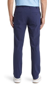 Smart performance construction offers serious comfort in versatile trousers with professional appeal. 15" leg opening; 9 1/2" front rise; 16" back rise Zip fly with hook-and-bar closure 100% polyester Machine wash, tumble dry Imported Fitted Tapered Leg Golf Pants, Male Crown, Crown Crafts, Peter Millar, Nordstrom, Trousers, Crown, Bar, Navy