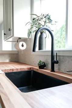 the kitchen sink is clean and ready to be used as a counter top for cooking