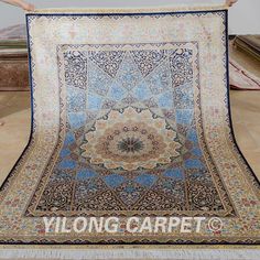 New design blue handmade silk rug from Yilong Carpet factory. Size: 5.5x8ft PRICE: $10560  Please contact Ms Alice for discount if you are sure to purchase it, Email: alice@yilongcarpet.com WhatsApp: +86 15638927921 Cheap Rugs, Modern Carpet