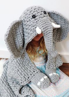 A cute blanket to crochet with attached mittens. Kit includes Softee Chunky and Mary Maxim Starlette yarns to make child's size. Bonus patterns to make baby & adult sizes too! Moss Stitch Pattern, Crochet Elephant Pattern, Ornaments Crochet, Elephant Blanket, Confection Au Crochet, Crochet Elephant, Hand Crochet Baby Blanket, Ideas Crochet, Crochet Christmas