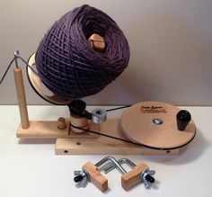 a ball of yarn sitting on top of a machine