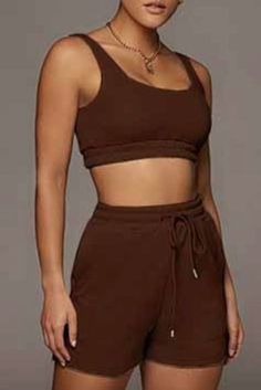 Lounge in style with this cropped tank top and high waist short two pieces set. Soft knitted fabric. Top features a scoop neckline, tank straps with an elastic cropped hem; includes high waist shorts with drawstrings. Colors: Sand, Cocoa, Bubble Gum, Storm Sizes: S, M, L, XL Fabric: 65% cotton 35% polyester Lounge Wear Set, High Waist Short, High Waist Shorts, Wish List, Cropped Tank Top, Crop Tank, Bubble Gum, High Waisted Shorts, Scoop Neckline