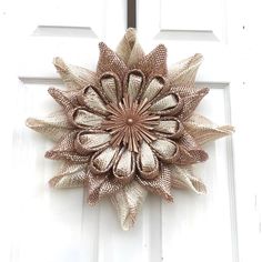 a door with a metal flower on it