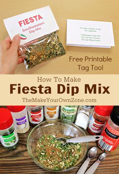 a hand holding a bag of fiesta dip mix next to some spices and seasonings