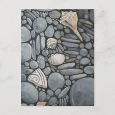 a painting of rocks and shells on the ground