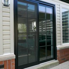 an open window on the side of a house