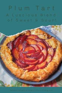 a close up of a pie on a plate with the words plum tart above it