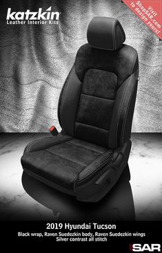 the seat cover is black and has red stitching on it, with text that reads leather