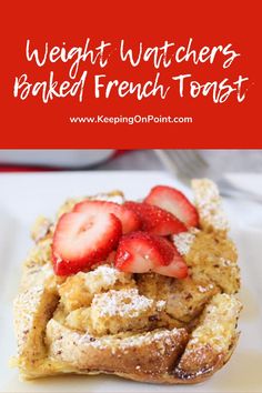 french toast with strawberries on top and the words baked french toast over it in front