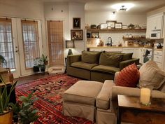 a living room filled with furniture and decor