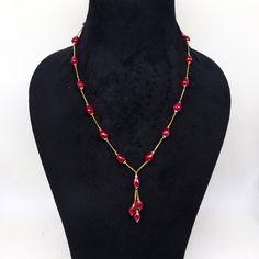 22kt yellow gold handmade charm necklace with 18-carat red ruby stone charm delicate jewellery. Metal-22kt yellow gold. Item type- Necklace. Length-18 inches to 26 inches. Ruby size-7 mm approx. Stamped-22kt hallmarked. Stone-ruby. Gross weight-20.770 grams for 18". Stone weight-18 carats(for 18")  Makes excellent giftng or collectible items. Yellow Gold Briolette Gemstone Bead Jewelry, 22k Gold Dangle Jewelry For Formal Occasions, Elegant Ruby Round Beads Jewelry, Formal Gold Jewelry With Gemstone Beads, Formal 22k Gold Dangle Jewelry, Round 22k Gold Temple Necklace As Gift, Handmade Ruby Jewelry For Gift, 22k Yellow Gold Kundan Necklace As Gift, Elegant Ruby Briolette Necklace