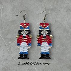 the beaded nutcracker earrings are designed to look like they have been made from beads