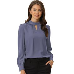 This beautiful blouse with cuffed sleeves and a keyhole design is sure to catch people's attention. The elegant and sophisticated design of the blouse will make you stand out in any setting. The blouse can be paired with suit pants or a pencil skirt, and when paired with heels, it creates a stunning look. The front neckline of the blouse is accentuated with a hollowed-out triangle, adding uniqueness and elegance to the classic design. This blouse is perfect for the cooler season and will be an i Keyhole Shirt, Professional Blouses, Women's Office, Chiffon Blouses, Womens Office, Button Blouse, Chiffon Long Sleeve, Work Looks, Suit Pants