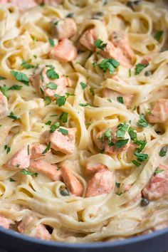 pasta with salmon and cream sauce in a pan