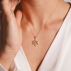 With this stunning Star of David Necklace line, you can boost your style level. Each piece is expertly created and represents faith, support, and eternal beauty. For those who understand the significance of the Star of David, choose between the elegant radiance of our 14K Real Gold Jewish Jewelry or the significant design of our 10K Solid Gold Star of David Necklace. Ideal as a heartfelt present for her or a significant way to show your support for Israel. EU and UK taxes; *EU and UK orders over Star Of David Necklace, Eternal Beauty, Present For Her, Jewish Jewelry, Presents For Her, Star Of David, Gold Star, Star Necklace, Memorial Gifts