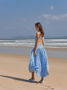 This product is a charming spaghetti strap dress that captures the casual essence of summer with its airy and free-flowing design. The bodice is neatly shirred, providing both texture and a snug fit, while the skirt flares out from a cinched waist into a relaxed, breezy silhouette. Crafted from a lightweight fabric, this dress is perfect for sun-soaked days and warm evening gatherings. - The dress features slender spaghetti straps ideal for staying cool on hot days.- Shirring on the bodice adds a decorative touch while ensuring a flexible fit.- Its A-line skirt drapes gracefully, offering comfort and ease of movement.- The light fabric of the dress promises breathability and a soft feel against the skin. Spring Beach Sundress With Ruched Details, Spring Beachwear Midi Dress With Spaghetti Straps, Breezy Spaghetti Strap Midi Dress For Summer, Breezy Summer Midi Dress With Spaghetti Straps, Summer Midi Dress With Spaghetti Straps Lightweight, Summer Maxi Dress With Spaghetti Straps And Smocked Back, Breezy Sundress With Adjustable Straps, Summer Maxi Dress With Smocked Back And Ruffled Straps, Summer Ruched Maxi Dress With Ruffled Straps