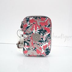 NWT Kipling AC7252 100 Pens Case Pencil Accessory Polyester Autumnal Field Multi Details: 100% Authentic Style number: AC7252 Polyester nylon with multi color (rouge red green grey white) Zip around closure 26 elastic loops Monkey charm Size approximately: 8.5" (L) x 2" (H) x 6" (D) Retail: $49 + tax Please note: The pattern is random 100 Pens is a must-have for anyone looking to keep small accessories organized and close at hand. The name says it all; you can fit up to 100 pens or pencils insid Kipling Pencil Case 100, Multicolor Rectangular Stationery Case For Daily Use, Trendy Multicolor Stationery For School, Trendy Multicolor School Stationery, Trendy Multicolor Stationery For Gifts, Trendy White Stationery With Pen Slots, Trendy White Stationery For Personal Use, Multicolor Stationery With Pen Slots As Gift, 100 Pens