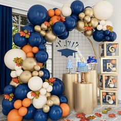 a graduation party with balloons and decorations