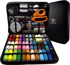 an open case filled with lots of different colored thread