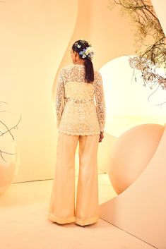 Featuring a pearlwork hand-embroidered jacket with flared pants. It comes with a bralet From Aneesh Agarwaal's Naksh collection. DELIVERY TIMEPlease allow 8-12 weeks for your outfit to arrive. FABRIC DETAILSPants, Satin Organza, Jacket-Tulle Professional cleaning only. Organza Jacket, 12 Weeks, Flared Pants, Embroidered Jacket, Professional Cleaning, Pant Set, Flare Pants, Your Outfit, Hand Embroidered