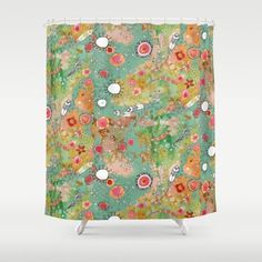 a shower curtain with an animal and flowers pattern on the front, in green background