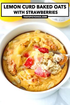 a bowl of lemon curd baked oats with strawberries