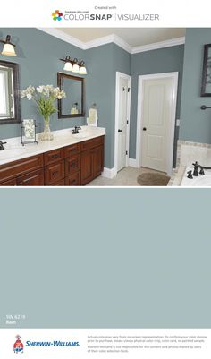 a bathroom with blue walls and white trim on the door is featured in this article