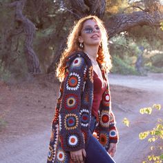 Granny square crochet afghan cardigan/coat in premium high-quality wool that feels super warm and cozy. This granny square patchwork jacket is the perfect outfit for autumn-winter days. If you want to be unique in your boho-chic style, then choose this sweater. YARN: High-Quality Wool Blend COLORS: Can be customized. (Please note that light effect, monitor's brightness, contrast etc. May cause a slight color difference) MEASUREMENTS: The measurement table is at the end of the photos. If you have Bohemian Crochet Hooded Outerwear, Bohemian Hooded Crochet Cardigan, Bohemian Crochet Sweater Coat For Fall, Brown Crochet Outerwear For Winter, Handmade Bohemian Hooded Outerwear, Bohemian Handmade Hooded Outerwear, Long Winter Outerwear With Granny Square Details, Winter Long Outerwear With Granny Squares, Bohemian Hooded Sweater Coat For Fall