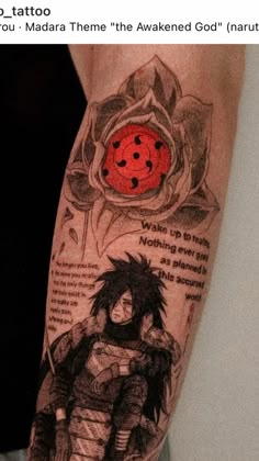 a person with a tattoo on their arm that says, you madara them the awake god