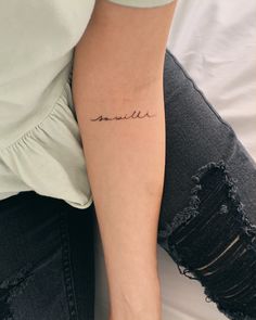 a woman's arm with the word danielle written in cursive writing on it