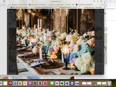 an image of a table setting with candles and flowers on it, as seen in the web browser