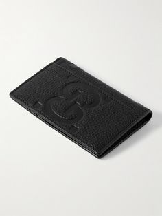 This bifold cardholder features Gucci's 'GG Jumbo' motif, an overszied version of the label's classic monogram. It's been crafted in Italy from full-grain leather and fitted with eight card slots and two receipt pockets. Gucci Classic Wallets With Logo, Black Luxury Card Holder With Engraved Logo, Luxury Black Card Holder With Engraved Logo, Designer Black Bifold Card Holder, Designer Business Wallets With Logo, Designer Business Wallet With Logo, Luxury Bifold Card Holder With Card Slots, Elegant Rectangular Logo Card Holder, Gucci Rectangular Wallet With Rfid Blocking