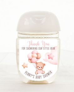 a baby shower bottle with a teddy bear on it's back and thank you for showing our little bear