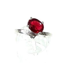 Immerse yourself in the world of elegance and charm with this pretty fashion jewelry ring, which is refined with a red glass stone. The ring, made of high-quality 925 silver plated, radiates a timeless shine with its silver plating and brings a touch of passion to your jewelry repertoire. The ring head, with a generous width of approximately 1 cm, proudly showcases the sparkling red glass stone that plays with every ray of light and surrounds your hand with a mysterious aura. The ring size EU 58 Red Nickel Free Rings, Red Ruby Solitaire Jewelry, Red Sterling Silver Crystal Ring, Nickel-free Red Ring Jewelry, Red Oval Sterling Silver Crystal Ring, Red Oval Crystal Ring In Sterling Silver, Red Sterling Silver Ring, Red Sterling Silver Crystal Ring Gift, Red Sterling Silver Ruby Ring