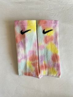 Pastel Rainbow Tie Dye Nike Socks | Baby, Toddler & Adult | Pastel Nike Socks | Rainbow Socks | Summer Socks | Tie Dye Socks PRODUCT DETAILS *Tie dyed nike socks infant, toddler and adult. *Pastel rainbow color. *Your choice of quarter or crew for adult socks. MATERIALS *Cotton, Polyester, Nylon, Spandex HOW TO CARE *Handwash or throw in wash alone after first use. *Then, continue to wash with similar colors (do not wash with whites). *If color red or pink is present please wash alone two additional times. *We recommend hang drying to prevent shrinkage. WHOLESALE *Please contact us to hear about our wholesale prices *10+ of the same item and same color qualifies for discount pricing. *Matching items are perfect for birthday parties, spa days, team events, school events or anything else! SI Dyed Nike Socks, Summer Socks, Rainbow Socks, Tie Dye Socks, Summer Sock, Rainbow Tie Dye, Nike Socks, Team Events, Rainbow Tie