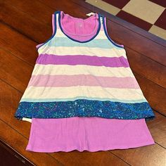 Nwt Justice Retail Store Layered Striped Tank Sequins Purple Blue Size 18 This Is A Double Tank Layered Look. The Striped Tank Is Attached To The Ribbed Tank Top Underneath. Playful Fitted Purple Tops, Blue Summer Sleepover Top, Blue Spring Top For Sleepover, Purple Sleeveless Top For Playwear, Sleeveless Purple Tops For Playwear, Fitted Blue Tops For Sleepover, Purple Stretch Cotton Tank Top, Stretch Cotton Purple Tank Top, Stretchy Purple Cotton Tank Top