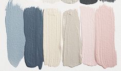 swatches of different shades of paint on a white background, including blue, pink, and grey